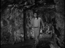 Jim walks through the cave
